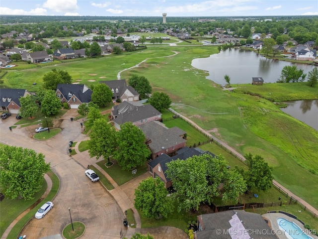 aerial view featuring a residential view and a water view