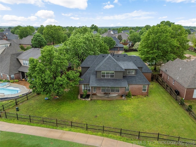 drone / aerial view with a residential view