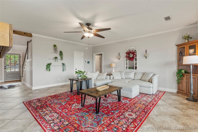 living room with stairs, ceiling fan, visible vents, and ornamental molding