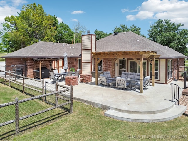 9998 E 460th Rd, Claremore, OK 74017 - back of property with an outdoor hangout area, brick siding, a chimney, and a patio area