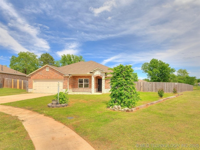 view of front of home featuring a garage, fence, a front yard, brick siding, and driveway