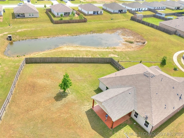 aerial view featuring a water view and a residential view