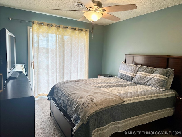 1082 Gaines Creek Loop, Eufaula, OK 74432 - bedroom with carpet, a ceiling fan, and a textured ceiling