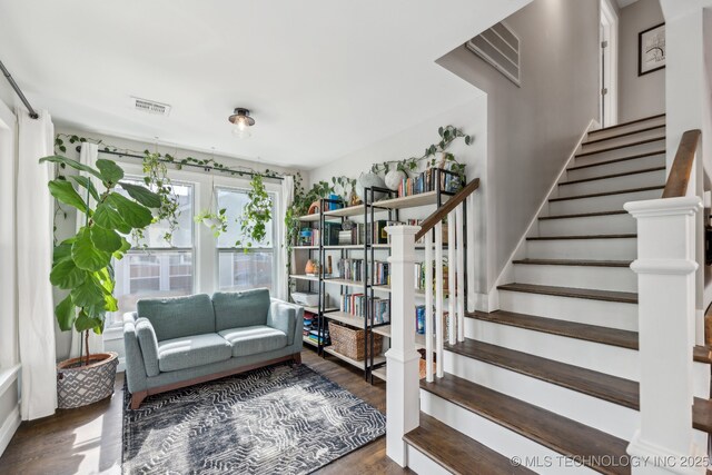 1304 W Easton St, Tulsa, OK 74127 - living room with visible vents, wood finished floors, and stairway