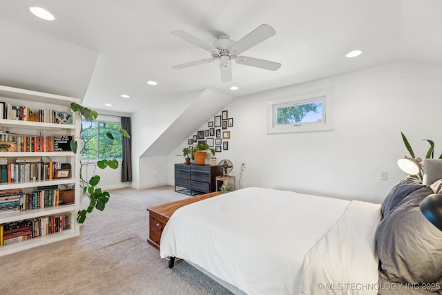 1304 W Easton St, Tulsa, OK 74127 - carpeted bedroom with multiple windows, a ceiling fan, recessed lighting, and lofted ceiling