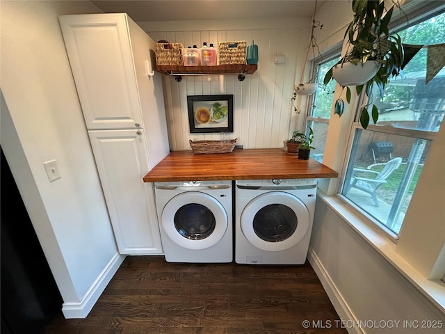 1304 W Easton St, Tulsa, OK 74127 - washroom featuring plenty of natural light, washing machine and dryer, dark wood-style flooring, and cabinet space