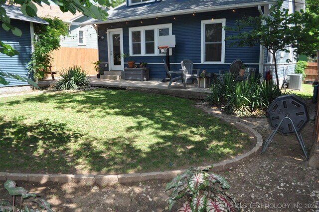 1304 W Easton St, Tulsa, OK 74127 - back of property with a shingled roof