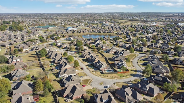 aerial view featuring a residential view and a water view