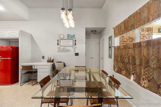 dining area featuring light tile patterned floors
