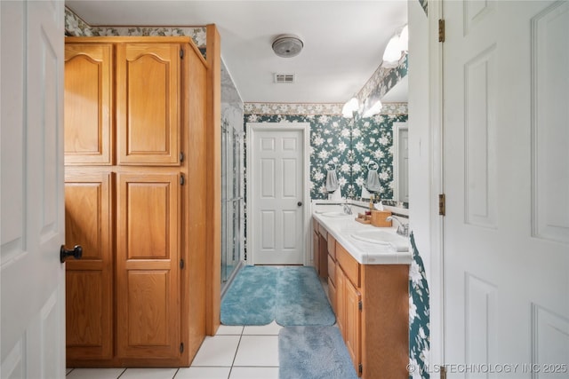 19978 E Murrell Rd, Tahlequah, OK 74464 - full bath with double vanity, a stall shower, a sink, wallpapered walls, and tile patterned flooring