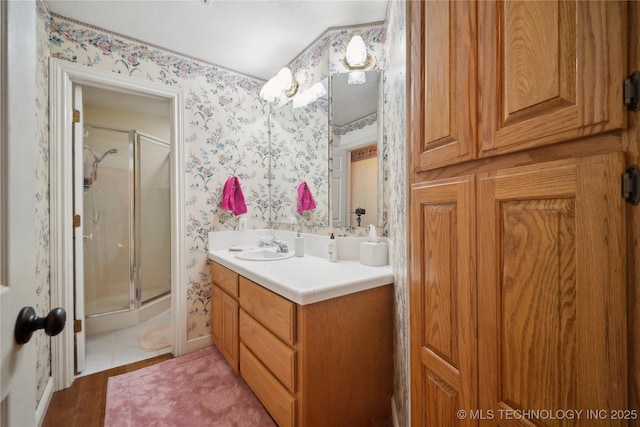 19978 E Murrell Rd, Tahlequah, OK 74464 - full bathroom featuring a stall shower, vanity, and wallpapered walls