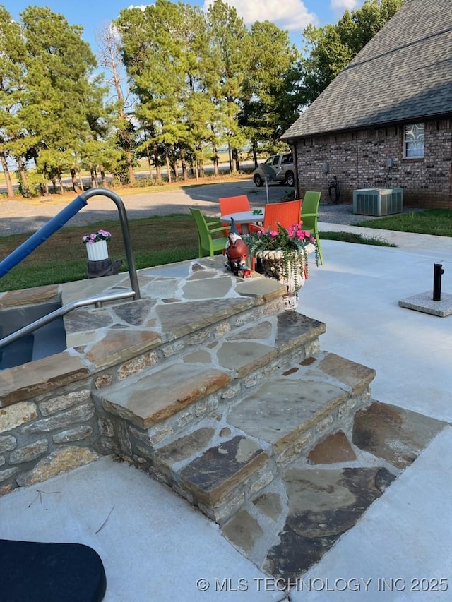 19978 E Murrell Rd, Tahlequah, OK 74464 - view of patio / terrace featuring central AC unit