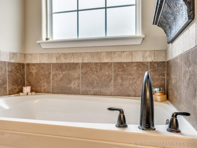 full bath featuring a bath