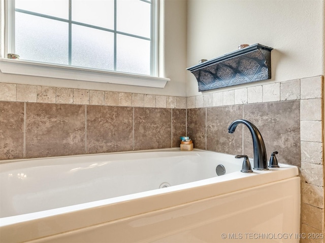 bathroom with a bath