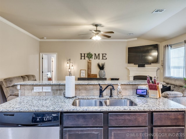 kitchen with dark brown cabinetry, a ceiling fan, dishwasher, a sink, and open floor plan