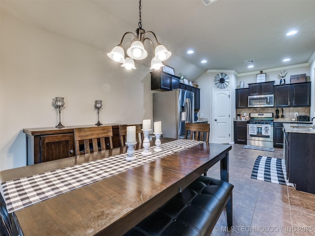 dining area featuring tile patterned flooring, a chandelier, recessed lighting, visible vents, and ornamental molding