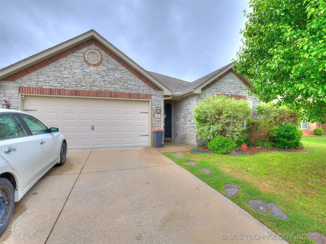 ranch-style house with a garage, a front lawn, driveway, and stone siding