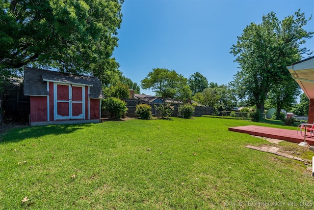 2305 S Hickory Pl, Broken Arrow, OK 74012 - view of yard with a shed, an outbuilding, and a deck