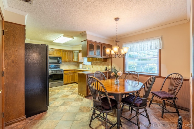 2305 S Hickory Pl, Broken Arrow, OK 74012 - dining area featuring crown molding, a textured ceiling, and a chandelier