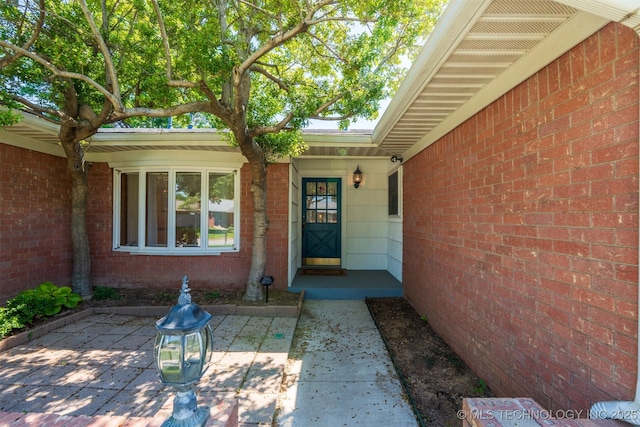 2305 S Hickory Pl, Broken Arrow, OK 74012 - entrance to property featuring a patio and brick siding