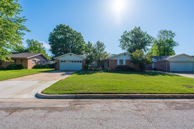 2305 S Hickory Pl, Broken Arrow, OK 74012 - single story home with brick siding, a front yard, concrete driveway, and an attached garage
