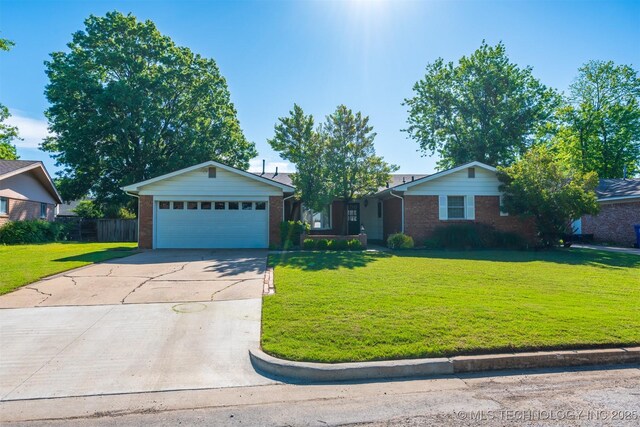 2305 S Hickory Pl, Broken Arrow, OK 74012 - ranch-style home featuring brick siding, an attached garage, and concrete driveway