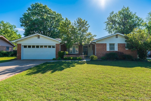 2305 S Hickory Pl, Broken Arrow, OK 74012 - ranch-style house with brick siding, an attached garage, concrete driveway, and a front lawn