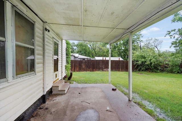 view of patio with entry steps and a fenced backyard