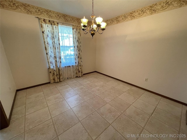 unfurnished room with an inviting chandelier, baseboards, and light tile patterned floors