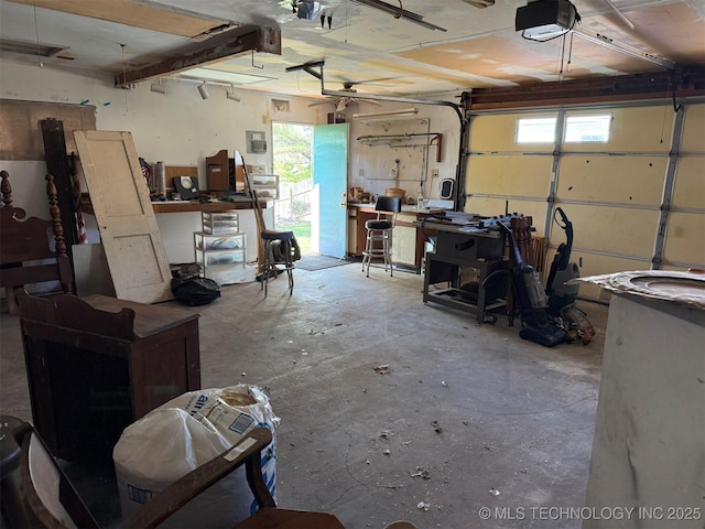 garage featuring a garage door opener