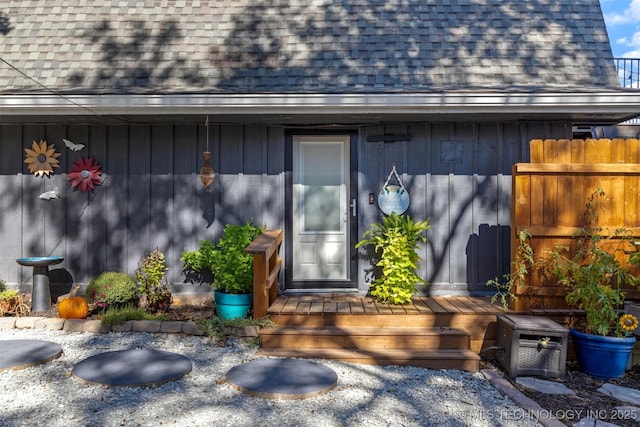 24591 S 613th Rd, Grove, OK 74344 - doorway to property featuring fence and a shingled roof