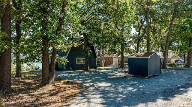 24591 S 613th Rd, Grove, OK 74344 - exterior space with a shed and an outbuilding