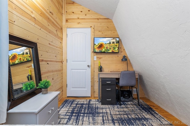 24591 S 613th Rd, Grove, OK 74344 - office space with a textured wall, wood walls, wood finished floors, and lofted ceiling