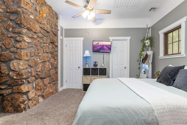 24591 S 613th Rd, Grove, OK 74344 - carpeted bedroom featuring visible vents and a ceiling fan