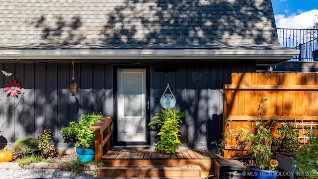 24591 S 613th Rd, Grove, OK 74344 - doorway to property featuring a shingled roof