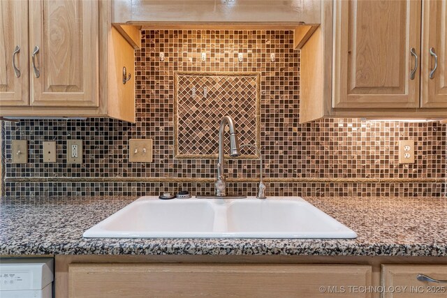 1007 W Beech St, Skiatook, OK 74070 - kitchen with a sink, light brown cabinetry, and backsplash