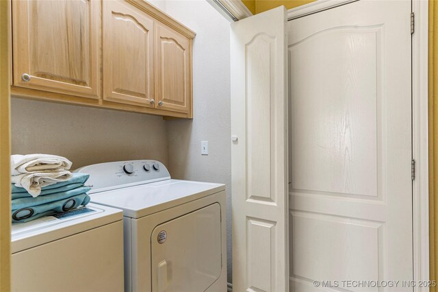 1007 W Beech St, Skiatook, OK 74070 - clothes washing area with cabinet space and washer and clothes dryer