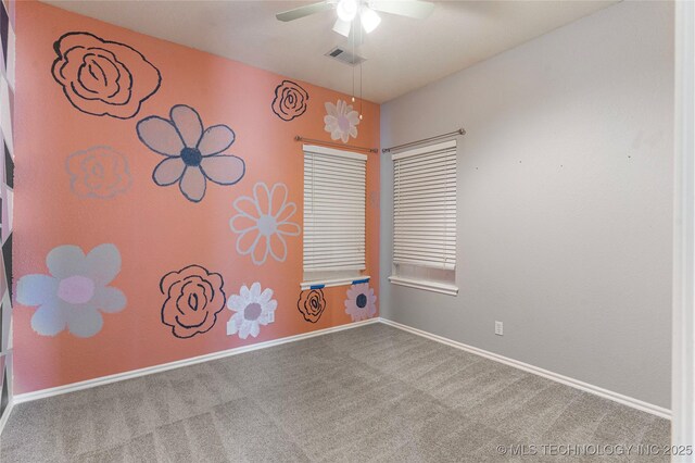 1007 W Beech St, Skiatook, OK 74070 - carpeted spare room with a ceiling fan, baseboards, and visible vents