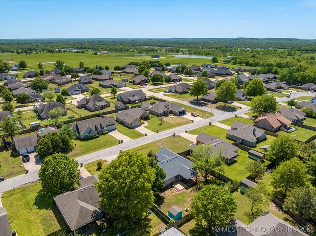 1007 W Beech St, Skiatook, OK 74070 - aerial view featuring a water view and a residential view