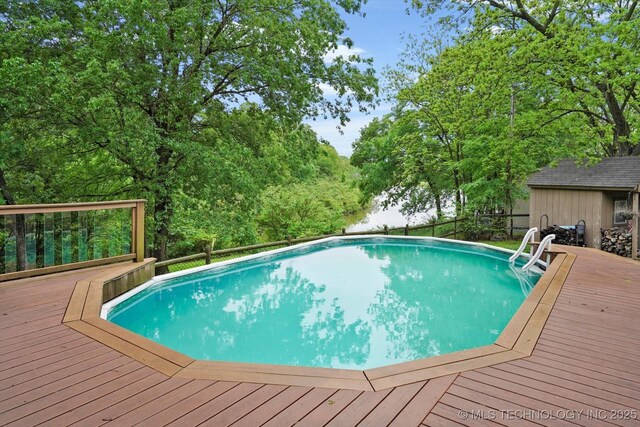 view of pool featuring a deck