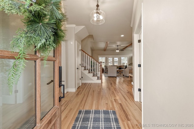 entryway with stairs, wood finished floors, baseboards, recessed lighting, and a ceiling fan