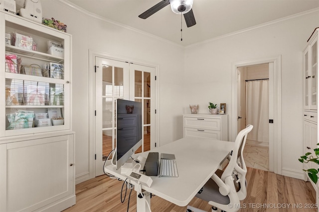 dining space featuring crown molding, ceiling fan, french doors, and light wood-type flooring