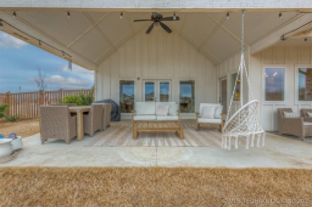 view of patio with fence, ceiling fan, and outdoor lounge area