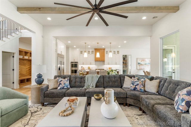 living room with recessed lighting, light wood-type flooring, ceiling fan, and beamed ceiling