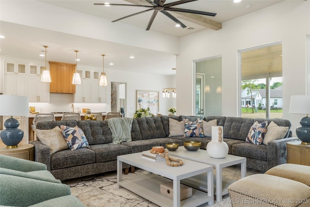 living area featuring recessed lighting, a ceiling fan, marble finish floor, and visible vents