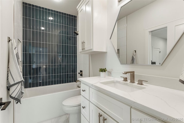 bathroom featuring shower / bathtub combination, toilet, marble finish floor, and vanity