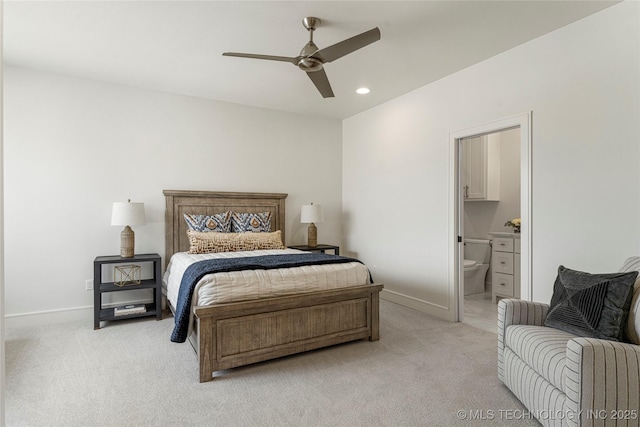 bedroom featuring ceiling fan, light colored carpet, baseboards, connected bathroom, and recessed lighting