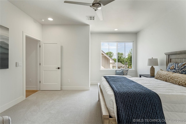 bedroom featuring a ceiling fan, visible vents, baseboards, carpet flooring, and recessed lighting