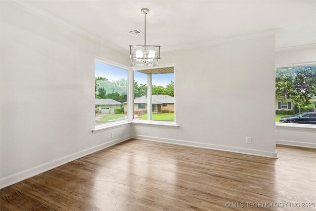 4814 E 37th St, Tulsa, OK 74135 - unfurnished dining area with crown molding, visible vents, plenty of natural light, and a notable chandelier