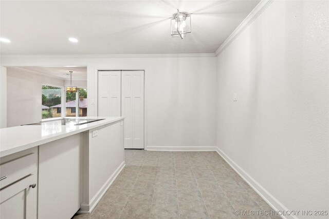 4814 E 37th St, Tulsa, OK 74135 - interior space featuring crown molding, baseboards, and recessed lighting